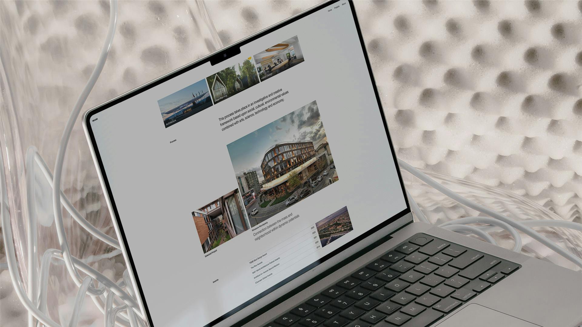 Website for architecture studio, displayed on laptop